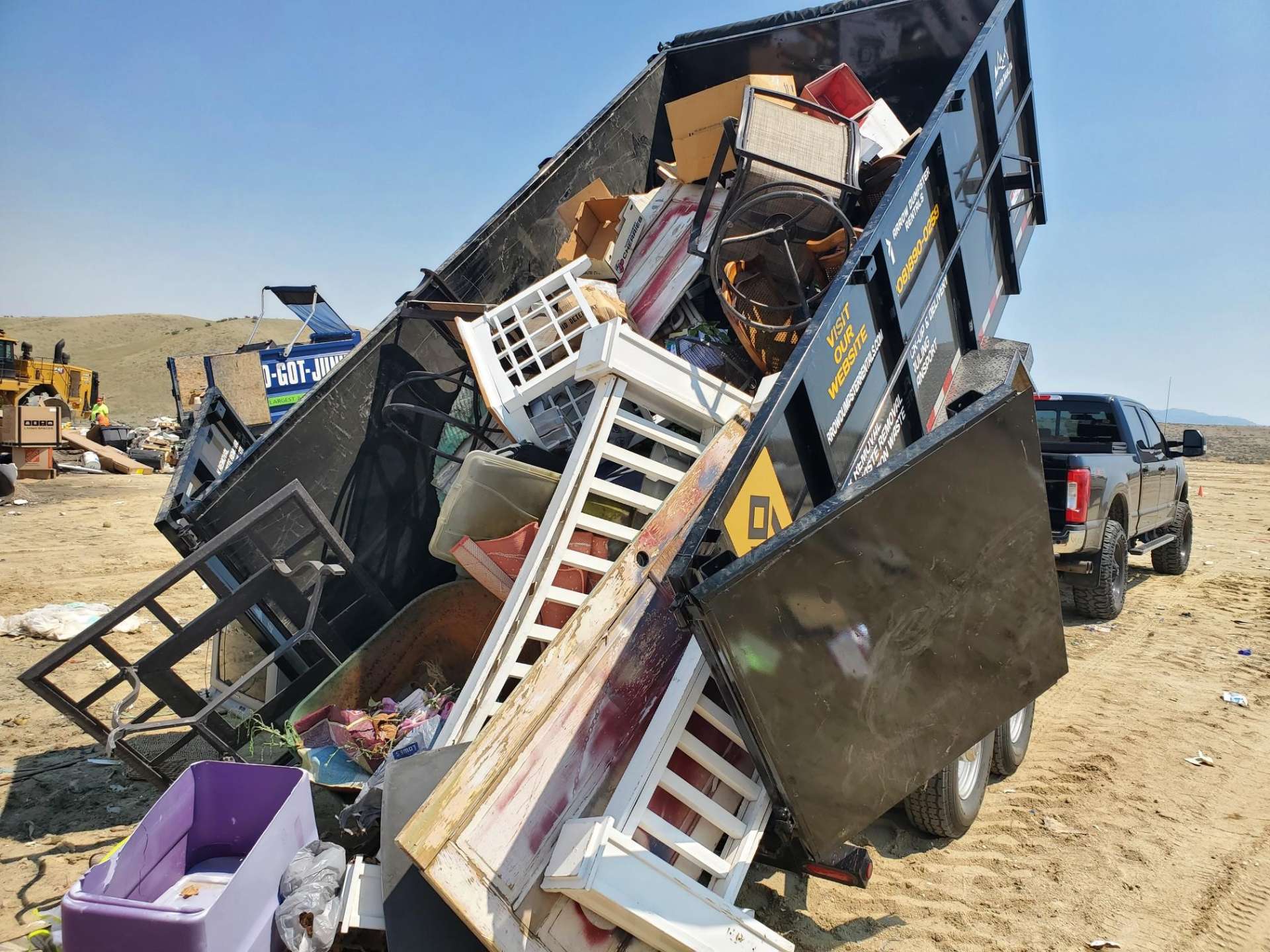 Junk Hauling Dumpster Trailer Rental - Toss and Tote