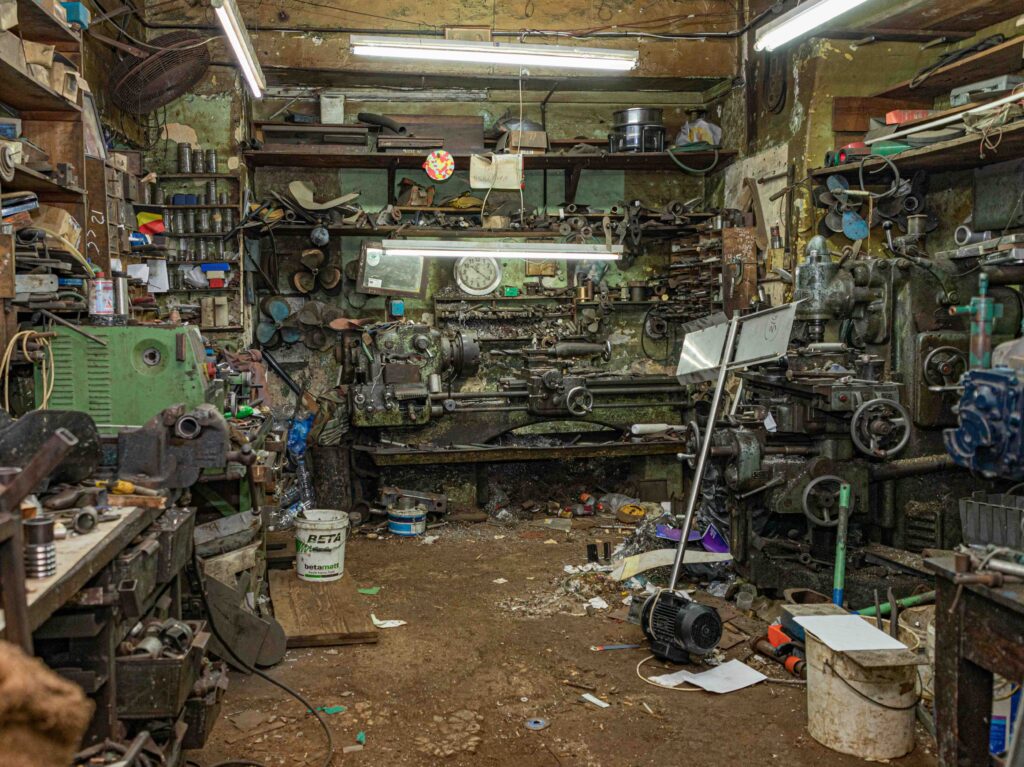A photo of a garage in need of a clean out.