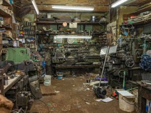 A photo of a garage in need of a clean out.